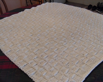 Knitted Baby Blanket in White.