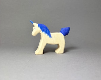 Baby unicorn handmade from maple wood