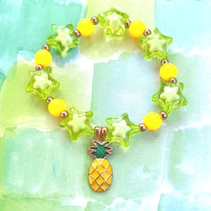 Pineapple charm bracelet | pineapple, stars, food, fruit, beads, bracelet, yellow, cute, green, charm bracelet