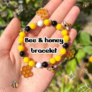 Bees & honey charm bracelet | bees, honey, yellow, insects, honeycomb, food, honeybees, animals, flowers, black, cute, beads, bracelet