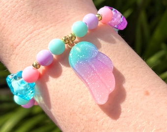 Angel Wing Charm Bracelet | wings, sparkles, gyaru, angel wings, pink, blue, purple, gold, cute, beads, bracelet, stars