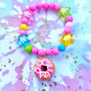 Donut charm bracelet | donuts, sprinkles, pink sprinkle donut, rainbow, desserts, frosting, cake,  cute, beads, bracelet, stars