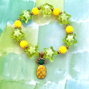 Pineapple charm bracelet | pineapple, stars, food, fruit, beads, bracelet, yellow, cute, green, charm bracelet