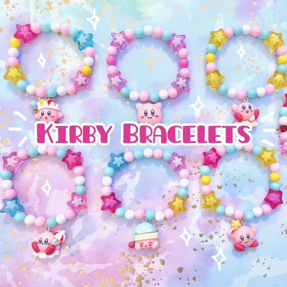 RESTOCKED!!! Kirby-inspired charm bracelets | Kirby, Poyo, cute, beads, stars, bracelet, game, pink, blue, yellow, rainbow, jewelry, white