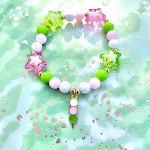 Dango charm bracelet | dango, rice cake, pink, white, green, Japanese food, mochi, sweets, Japanese desserts, cute, beads, bracelet, stars