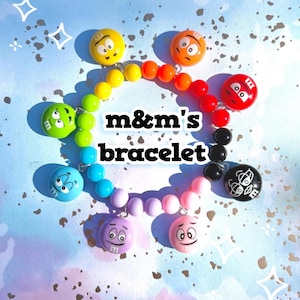 m&m&#39;s-themed bracelet | chocolate, candy, cute, desserts, beads, charm bracelet, rainbow, red, orange, yellow, green, blue, purple, black
