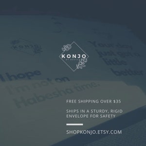 May include: A white graphic design logo with the text "KONJO BY DESIGN" in a square frame with floral accents. The text "FREE SHIPPING OVER $35" and "SHIPS IN A STURDY, RIGID ENVELOPE FOR SAFETY" are below the logo. The text "SHOPKONJO.ETSY.COM" is at the bottom of the image.