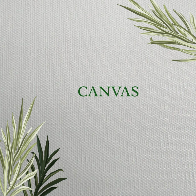 May include: A white canvas with the word "CANVAS" printed in green in the center. The canvas is textured and has a subtle pattern. There are green leaves in the top right and bottom left corners of the image.