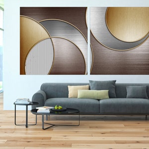 May include: Abstract art print with two panels featuring overlapping circles in shades of brown, gold, and silver.