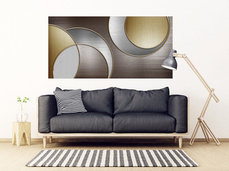 May include: Abstract art print featuring overlapping circles in shades of gold, silver, and brown. The circles have a metallic finish and create a modern and geometric design.