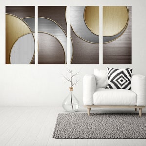 May include: A set of four abstract art prints featuring overlapping circles in shades of gold, silver, and brown. The prints are arranged in a grid pattern and have a modern, minimalist aesthetic.