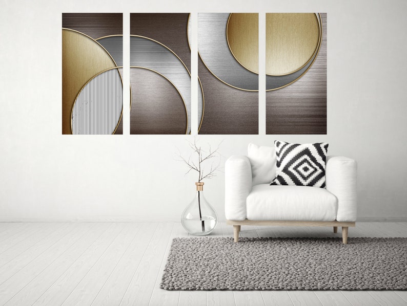 May include: A set of four abstract art prints featuring overlapping circles in shades of gold, silver, and brown. The prints are arranged in a grid pattern and have a modern, minimalist aesthetic.