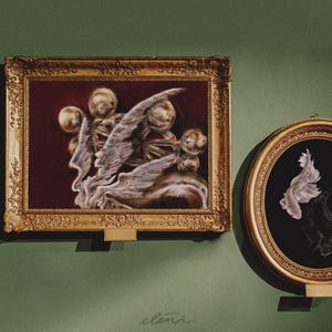 May include: A rectangular painting in an ornate gold frame featuring a dark red background with golden spheres and white, wing-like forms. Beside it, a smaller oval painting in a gold frame depicts a white fish against a black background.