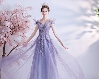 Light Purple And White Wedding Dresses - No matter the hue, purple has a mystical feel that naturally pairs nicely with green.