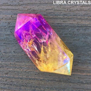 Puntas de cristal de cuarzo multicolores con doble terminación para una mejor coloración y curación.