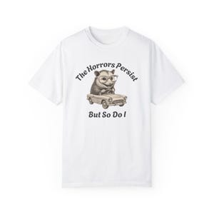 The Horrors Persist But So Do I Shirt - Retro Opossum Graphic Tee, Sarcastic Funny Mental Health Shirt, Unisex Vintage-Style Possum Shirt