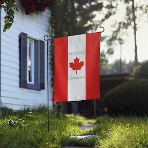 May include: A red and white garden flag with a Canadian maple leaf and the text "Proudly Canadian".
