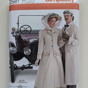 May include: Simplicity sewing pattern featuring a vintage design with a couple in period clothing. The pattern includes a long coat and accessories. The cover has the text "Simplicity" and "Kellie Anderson".