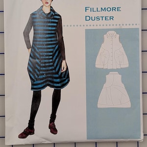 May include: A sewing pattern titled "Fillmore Duster" from The Sewing Workshop. The pattern features a drawing of a woman wearing a black and blue striped duster coat. The pattern also includes a diagram of the coat.