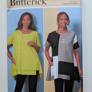 May include: A sewing pattern for a tunic top with two different styles. The pattern is from Butterick and is for sizes XSM-SML-MED. The pattern is designed by kAtheRine Tilton.