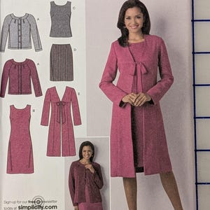May include: A Simplicity 2552 sewing pattern envelope for an easy chic clothing set. The front displays illustrations and photographs of a long-sleeved coat, a sleeveless dress, and a skirt in shades of pink and gray, labeled with sizes D5 4, 6, 8, 10, 12.