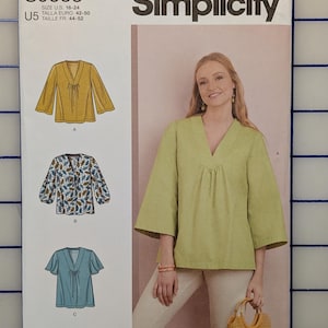 May include: Simplicity sewing pattern S9333, featuring three blouse designs with V-necks and various sleeve styles. The pattern includes sizes U.S. 16-24. The image shows a woman wearing a lime green blouse. Designed and printed in the USA.