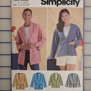 May include: Simplicity sewing pattern S9468 for jackets. The pattern features images of women wearing different jacket styles in pink, blue, and other colors. The pattern is easy-to-sew and designed and printed in the USA.