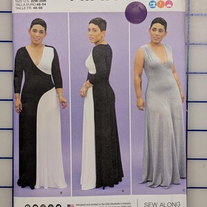 May include: A sewing pattern titled "MIMIGSTYLE" by Simplicity. The pattern features three images of a woman wearing different maxi dresses. The pattern size is U.S. 20W-28W. The pattern includes the text "SEW ALONG WITH MIMI G".