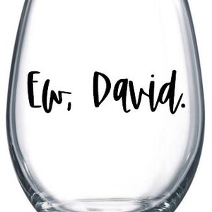 May include: Clear glass wine glass with the text "Mr. David." printed in black.