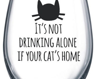 It's not drinking alone if the cat is home