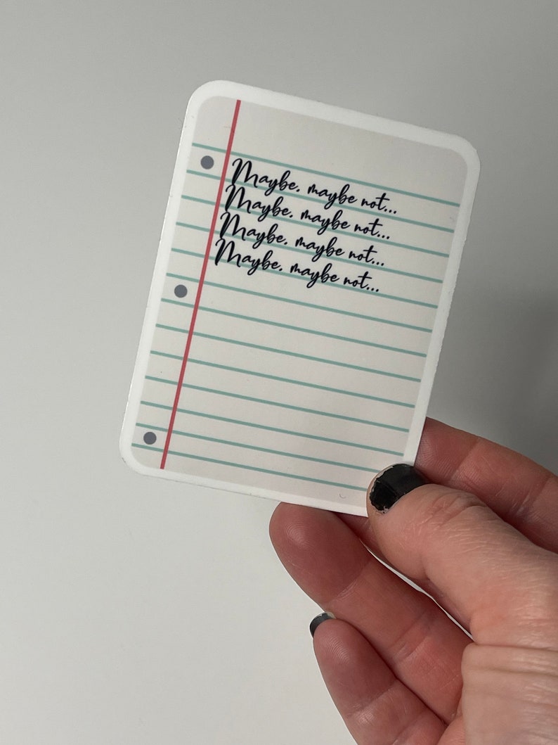 May include: A white sticker with a blue and green lined background and red lines. The sticker has black text that reads "Maybe, maybe not..." repeated four times.