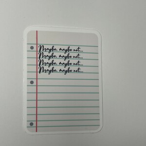May include: A white sticker with a red line and blue lines on a white background. The sticker has the text "Maybe, maybe not..." repeated four times.