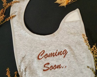 Pregnancy Reveal embroidered on Baby Bib