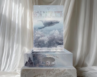 May include: A stack of three decorative blocks with a soft, ethereal aesthetic. The top block features a card titled "SALT WATER SPIRIT ORACLE Homecoming Edition" with a whale illustration. The middle block has a pearl design. The bottom block has a textured surface.