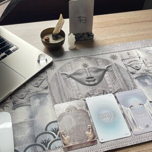 Hathor desk mat as the centerpiece of a spiritual altar, surrounded by candles, crystals, and sacred items. This mat creates a serene space for meditation, rituals, and connecting with the healing energy of Hathor.