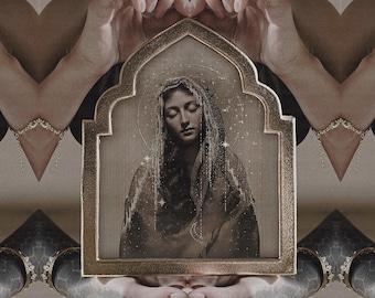 May include: A sepia-toned image of a framed religious portrait. The frame is gold-colored with an arched top. The portrait depicts a woman with a halo and stars, wearing a veil. The background features mirrored hands and jewelry.