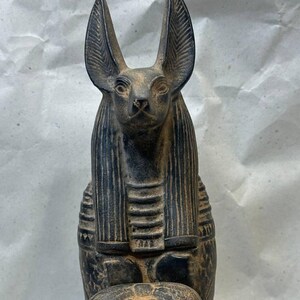 Anubis is a beautiful deity God, the Egyptian deity of death and mummification, sculpture, handcrafted reproduction of Egyptian mythology