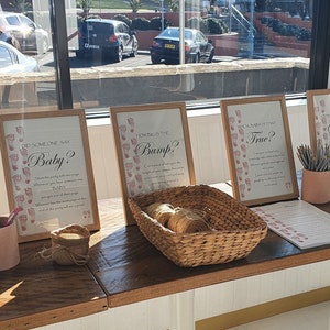 Juego de adivinanzas para baby shower &quot;qué tan grande es el bulto&quot; - pies de bebé rosados