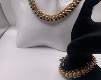 Hand woven gold and black beaded necklace and bracelet set