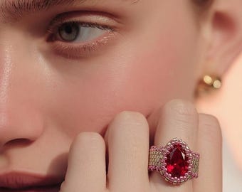 Ruby bezeled pear shaped ring; handwoven peyote stitch seed bead ring; statement ring