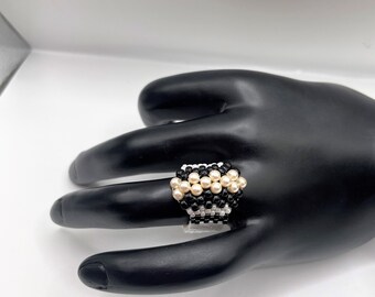 Woman's black and cream beaded ring