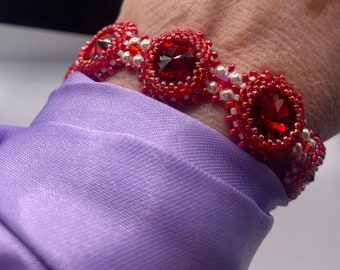 Women's red bezeled crystal bracelet with magnetic closure