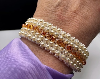 Women's 7 inch cream and topaz colored beaded cuff bracelet with magnetic closure