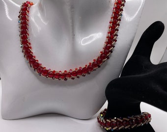 Beaded necklace and bracelet set woven in shades of red and gold