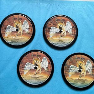 4, ‘Swan Song Label’ coasters hand crafted from original Swan Song Label vinyl records, black waterproof velvet backed