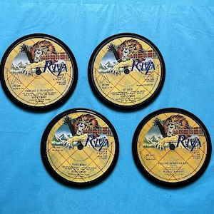 4 Rod Stewart coasters hand crafted from original Rod Stewart records, black waterproof velvet backed