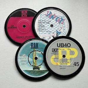 4 retro vinyl drinks coasters hand crafted from original vinyl records, black waterproof velvet backed (random selection)