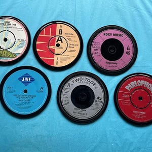 6, 1980s drinks coasters hand crafted from original vinyl records, black waterproof velvet backed  (random titles)