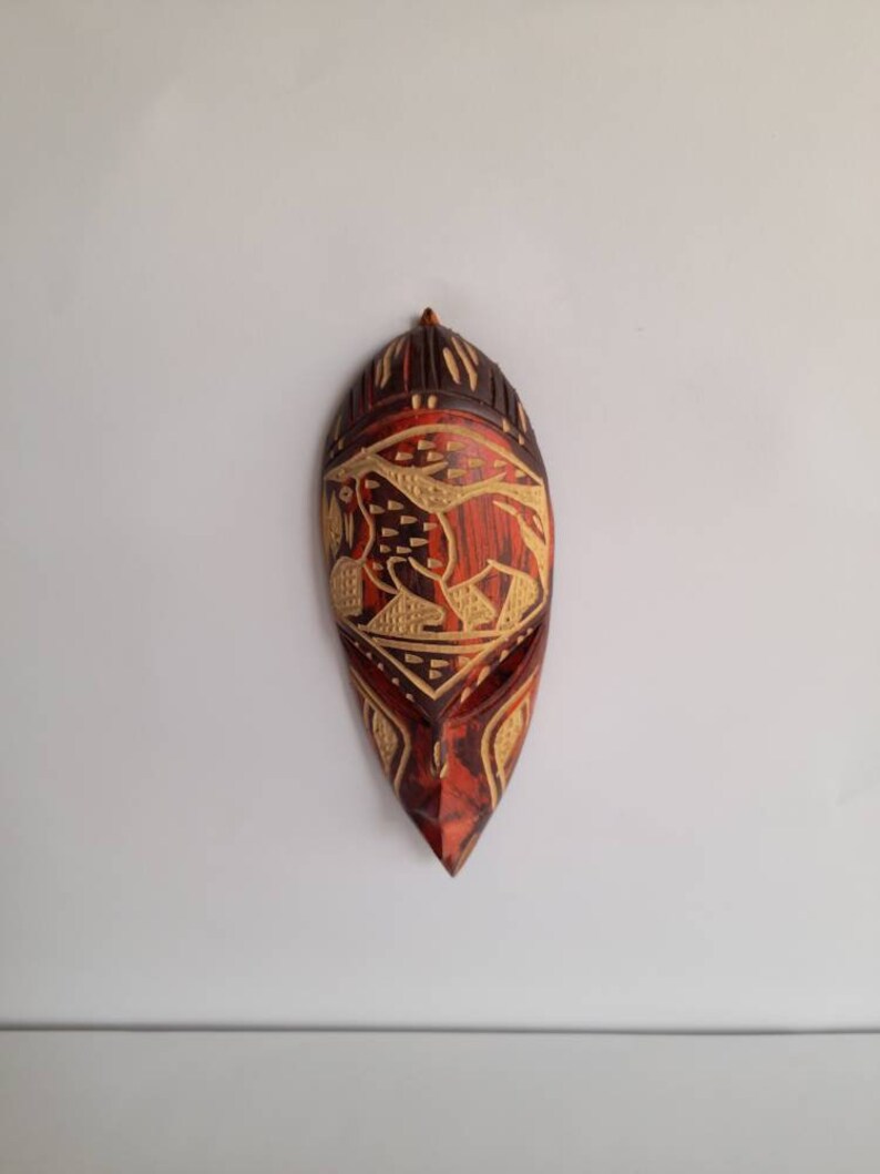 African lion,walking lion,African mask,wall hanging,Wooden lion mask,carved lion,design lion,sculpture,colourful mask,Ghana artefacts