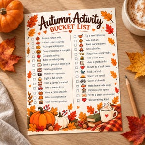 May include: A printed Autumn Activity Bucket List on white paper featuring a list of seasonal tasks with checkboxes and colorful illustrations of pumpkins, leaves, books, and a mug. The text is written in dark brown script and block letters.